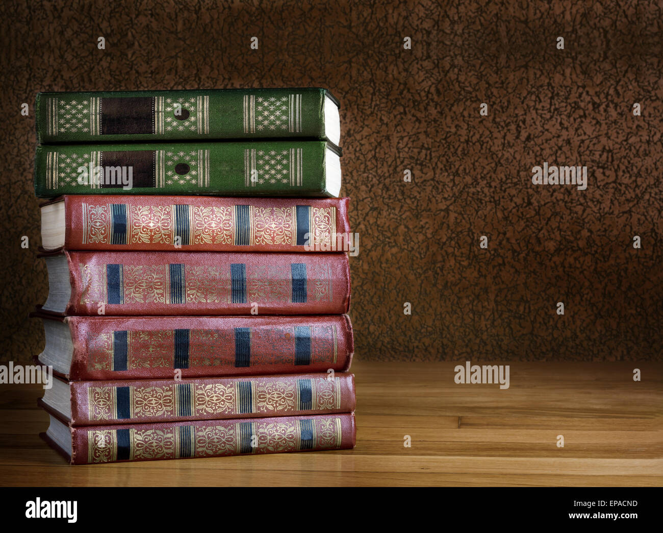 Pile of old books on a beautiful wooden table Stock Photo - Alamy