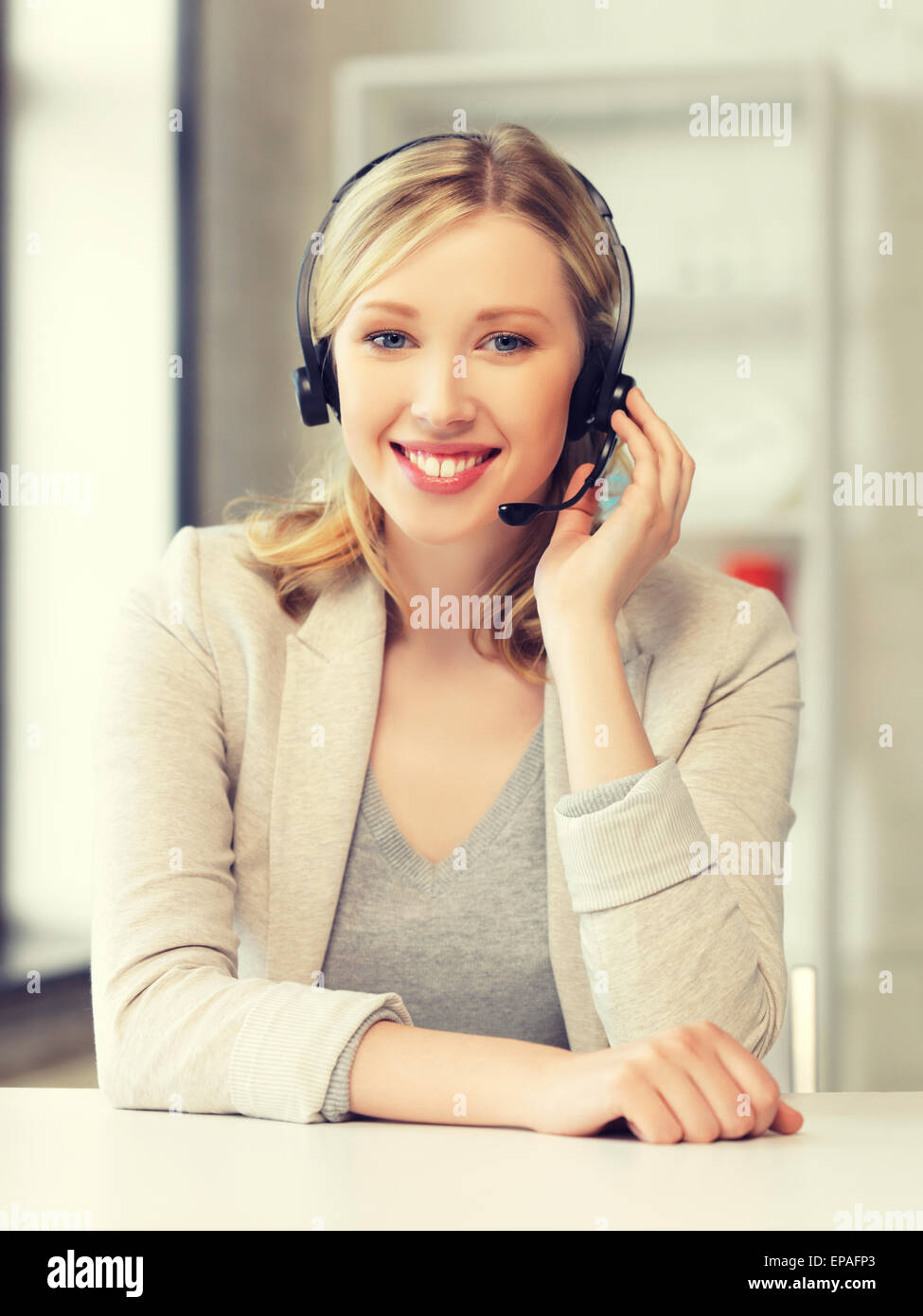 Friendly Female Helpline Operator Stock Photo Alamy