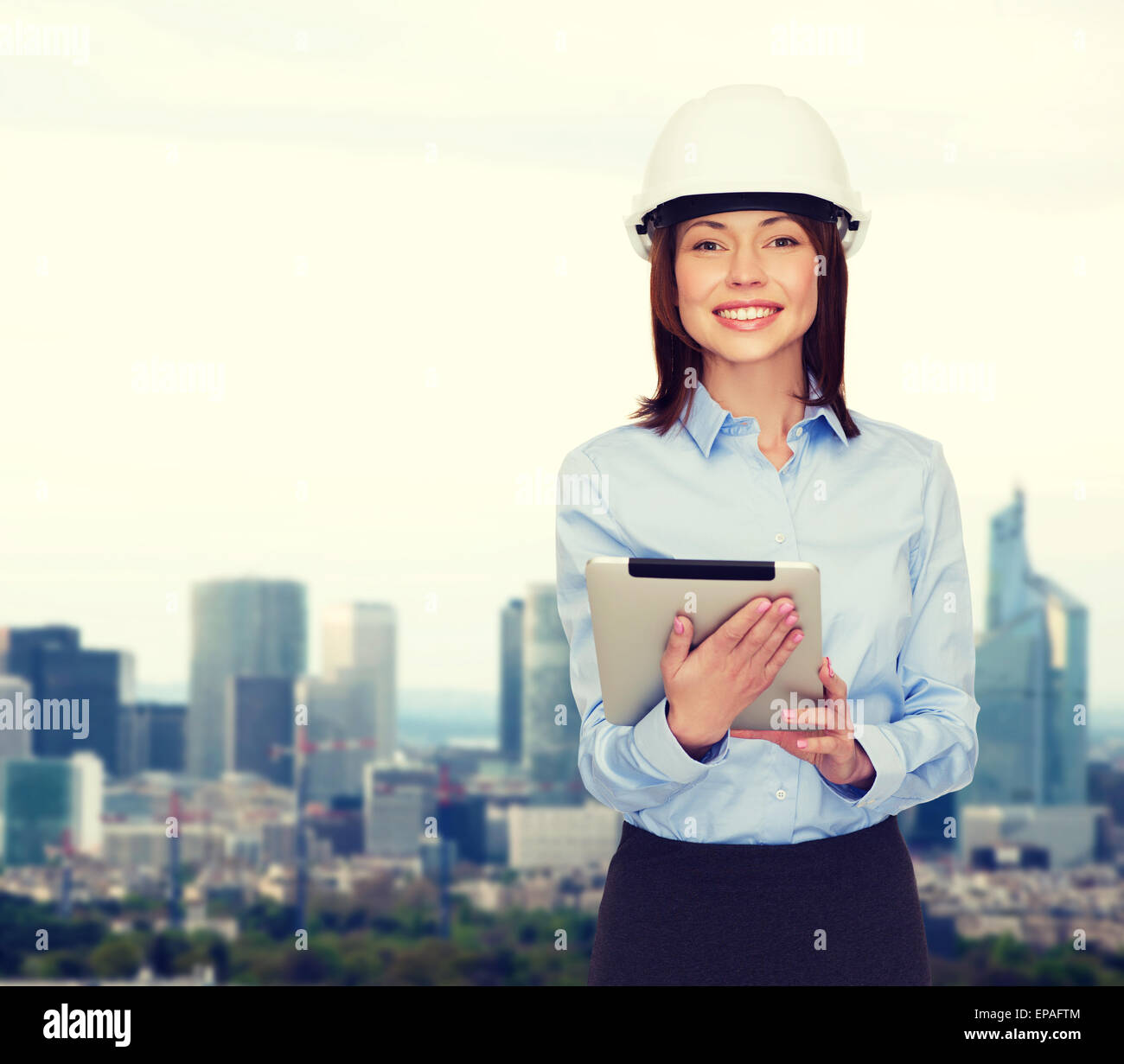 young smiling businesswoman in white helmet Stock Photo - Alamy