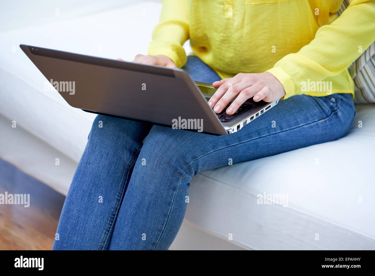 close up of woman with laptop computer at home Stock Photo