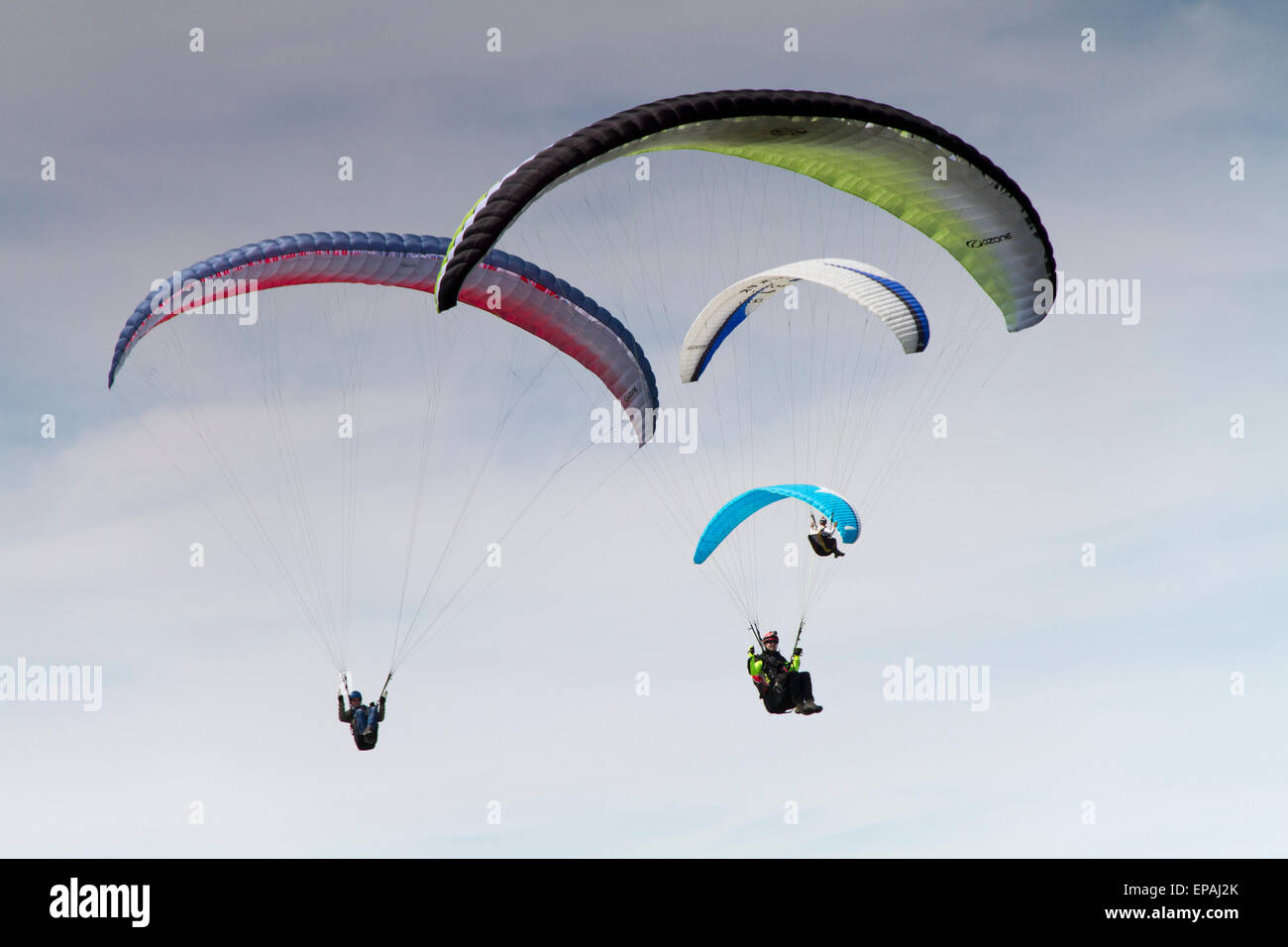Four paragliders Stock Photo