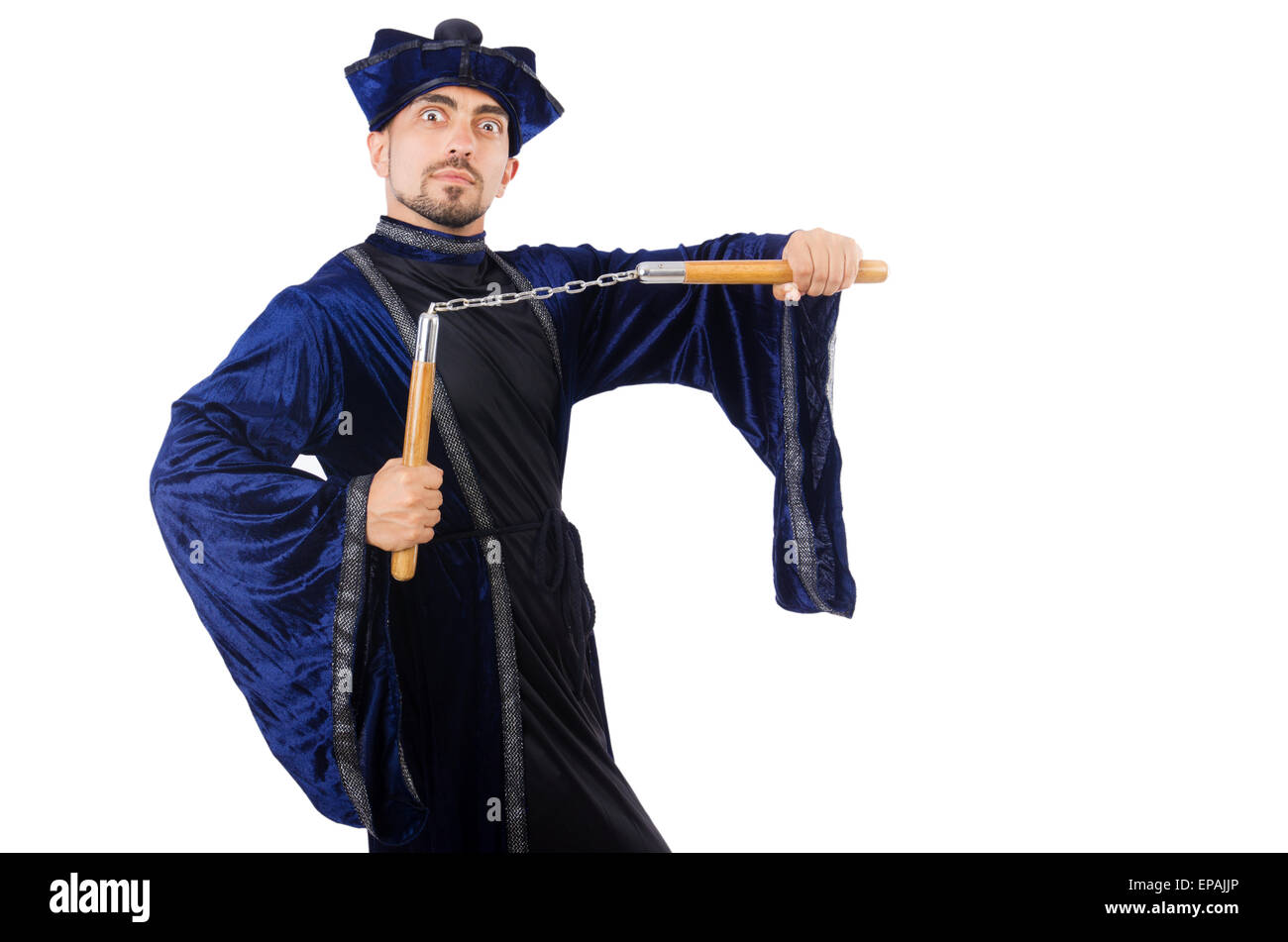 Martial arts master with nunchucks on white Stock Photo Alamy