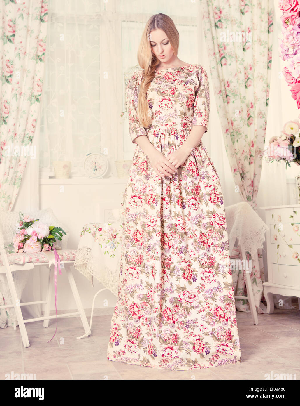Portrait of the beautiful blond girl in long dress Stock Photo - Alamy