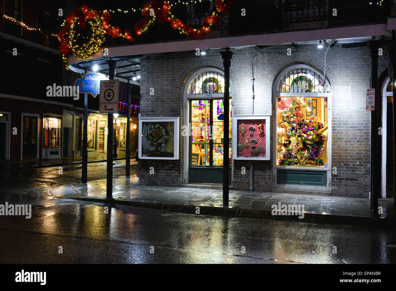 The upscale and unique, Razzle Dazzle Decor and Gift store, on Royal St., on rainy night, French