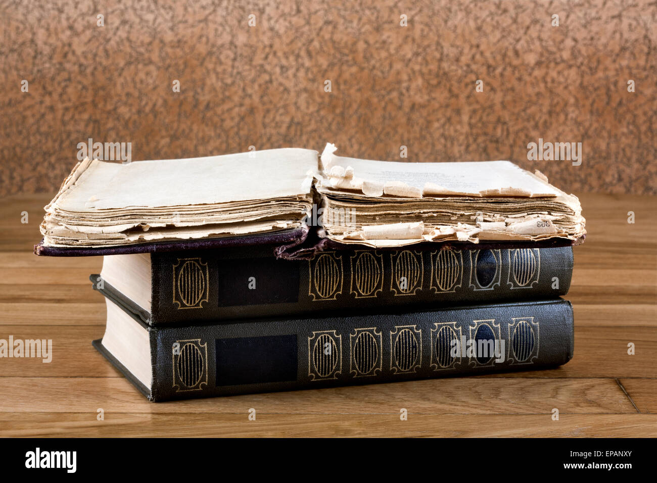 Pile of old books on a beautiful wooden table Stock Photo - Alamy