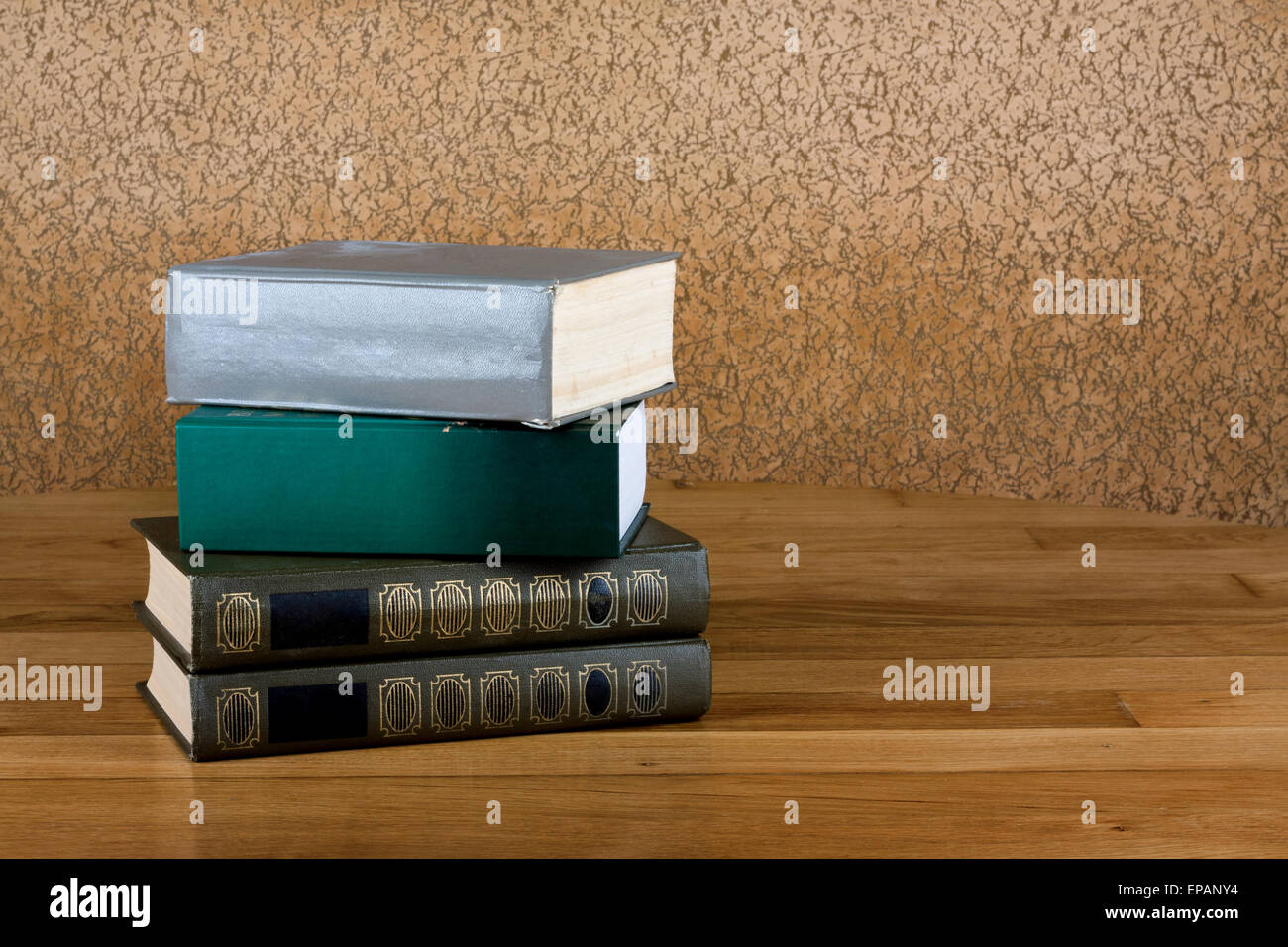 Pile of old books on a beautiful wooden table Stock Photo - Alamy