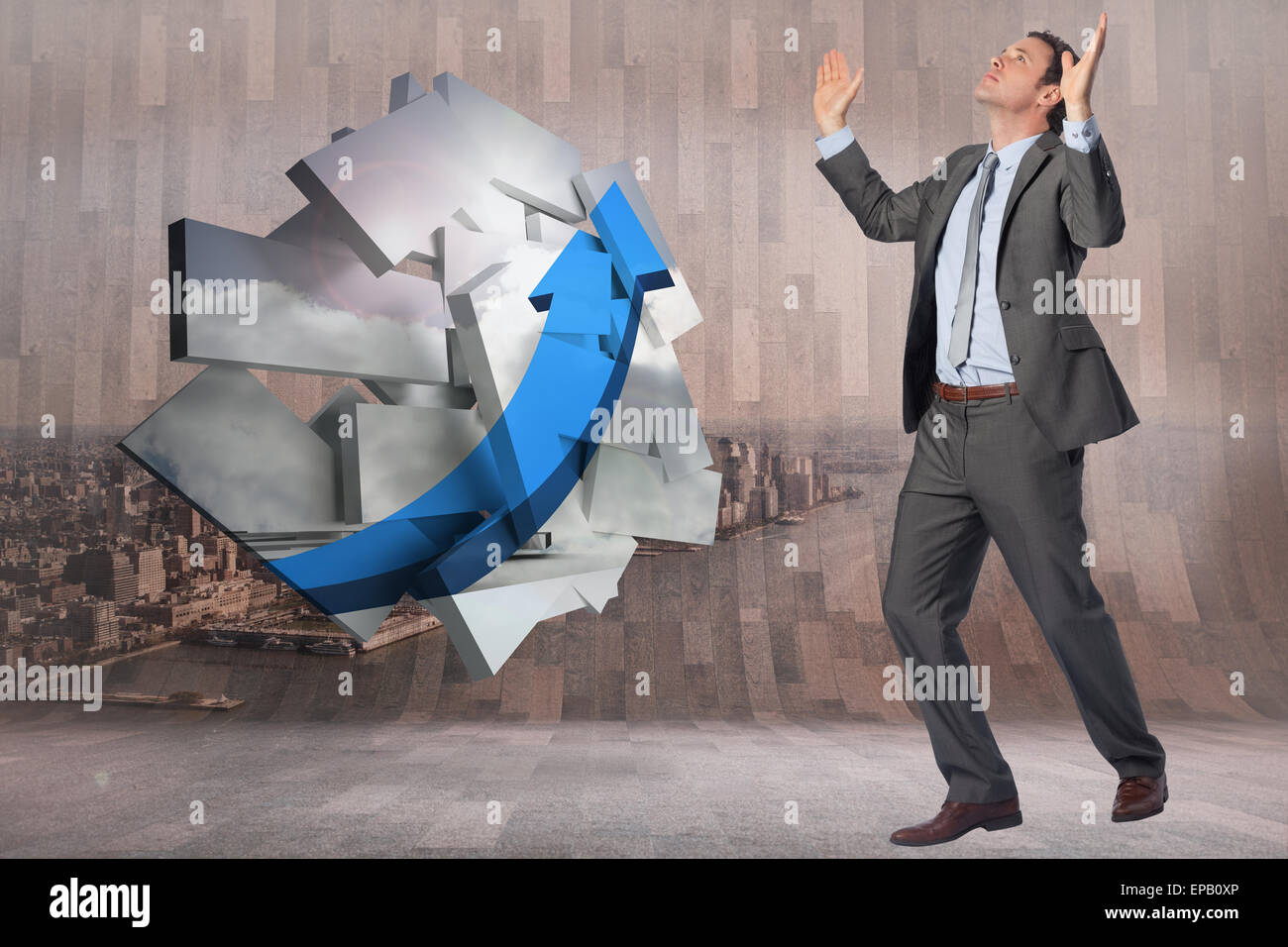 Composite image of businessman posing with arms raised Stock Photo - Alamy