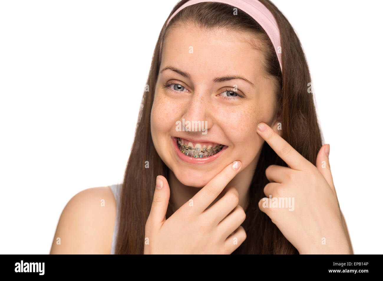 Teenage girl braces touching hair hires stock photography and images