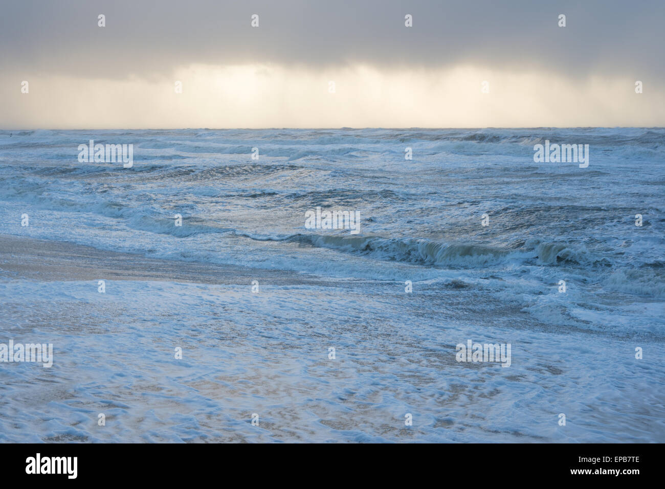 Stormy sea as seen from the beach with high waves Stock Photo