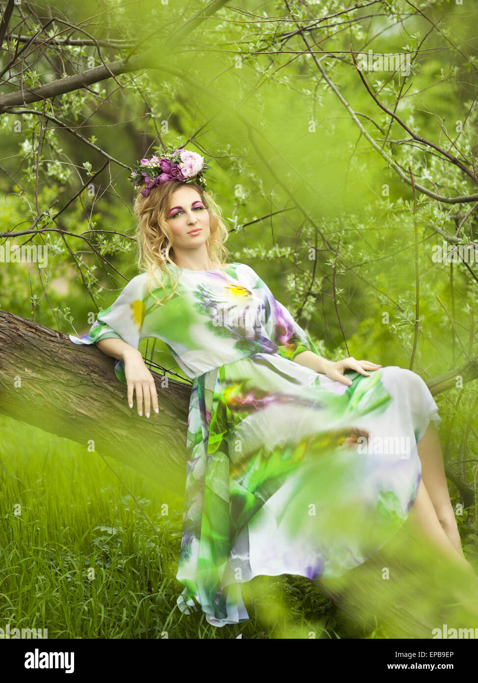 Portrait of a young girl woman in spring forest Stock Photo - Alamy