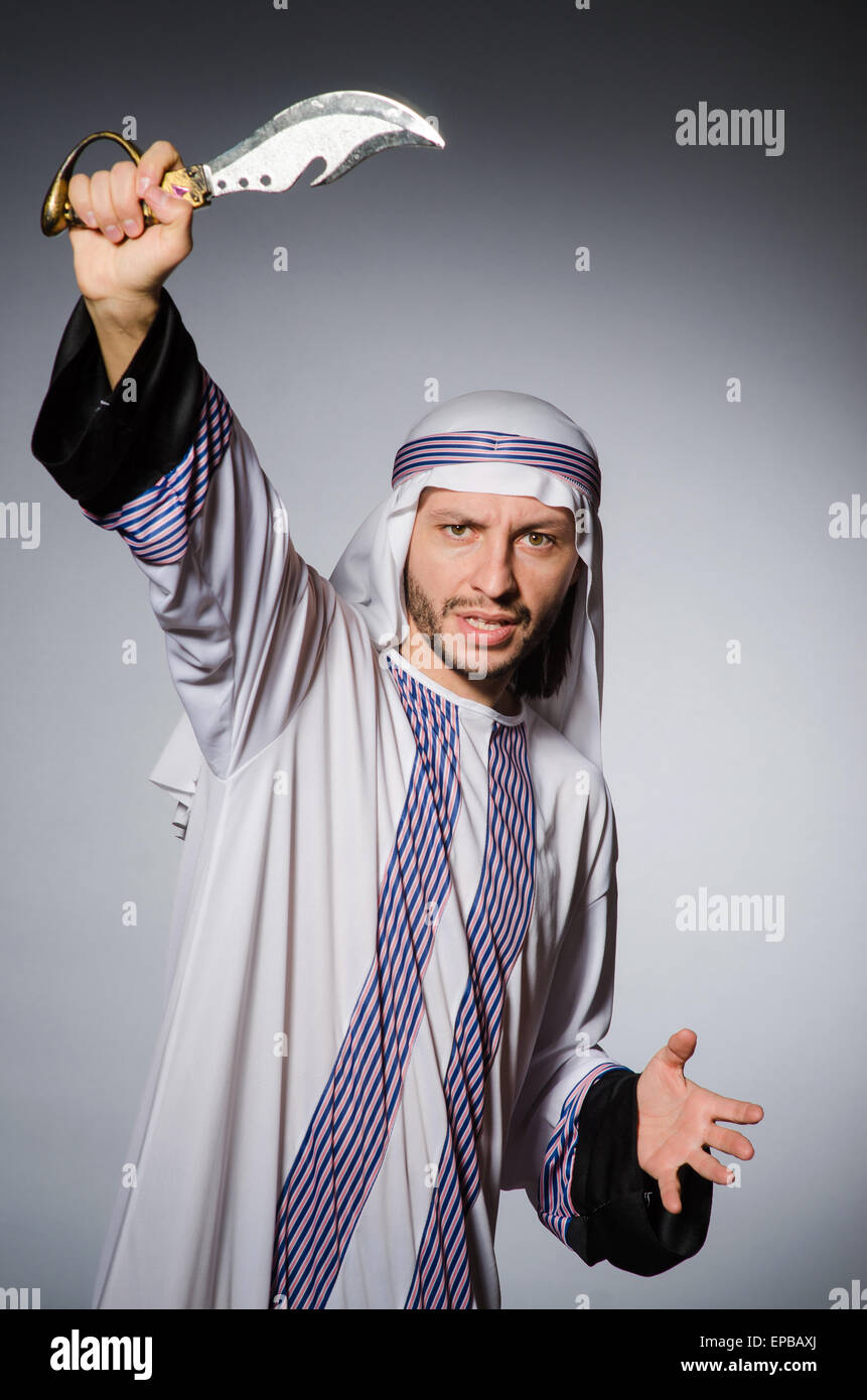 Arab man with sharp knife Stock Photo