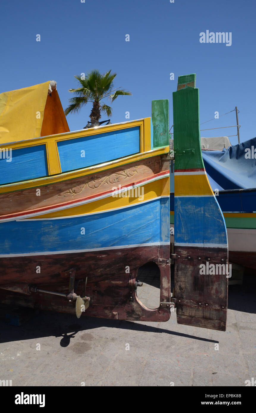 Traditional Maltese luzzu in Marsaxlokk harbour Stock Photo - Alamy