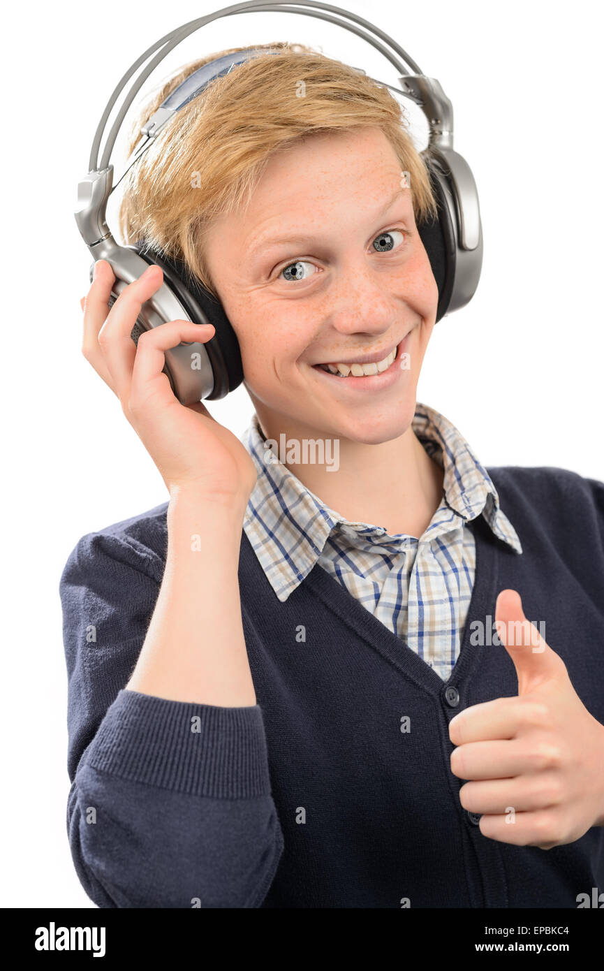 Happy teenage boy with headphones thumb-up Stock Photo