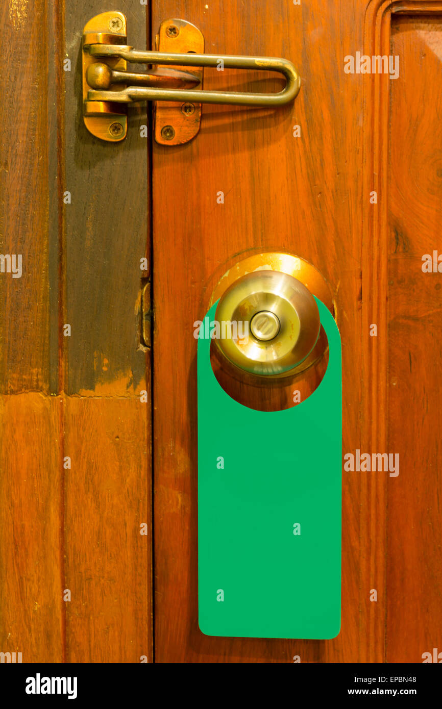 sign on the wood door handle Stock Photo