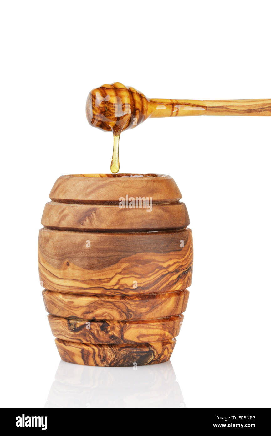 wooden honey pot with dipper, isolated on white Stock Photo Alamy