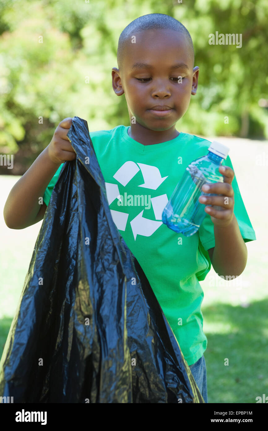 Boy holding trash bag hires stock photography and images Alamy