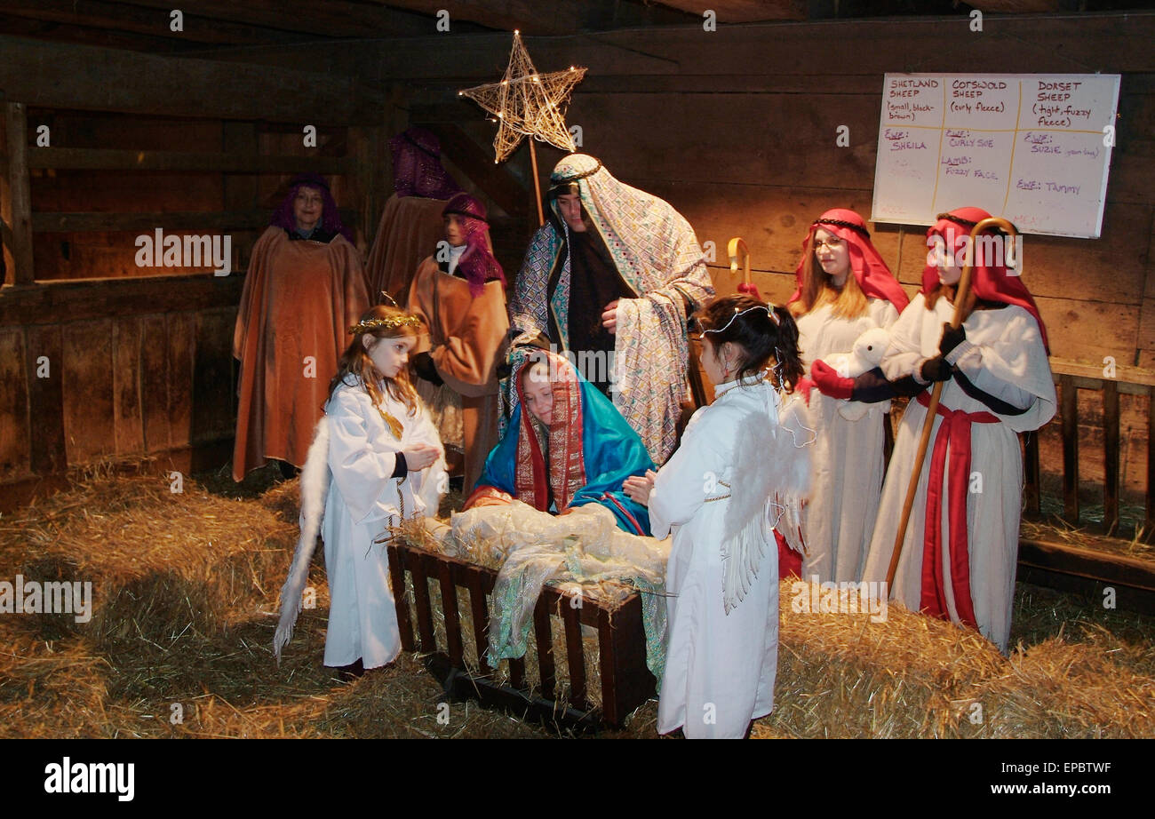 Kids and adults in a Christmas scene at Riverdale Farm; Toronto, Ontario, Canada Stock Photo