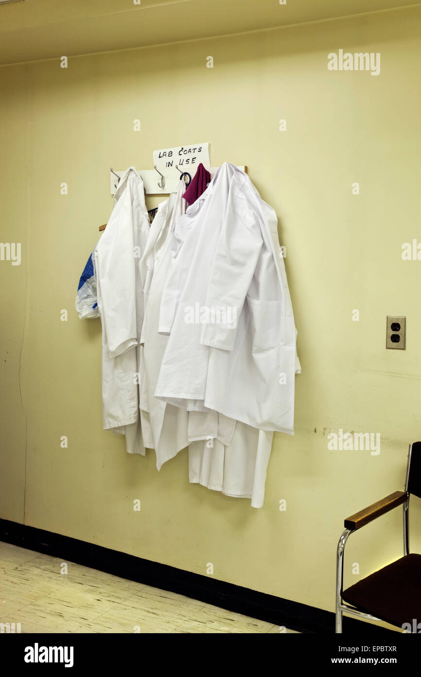 White Lab Coats On A Hook Stock Photo Alamy
