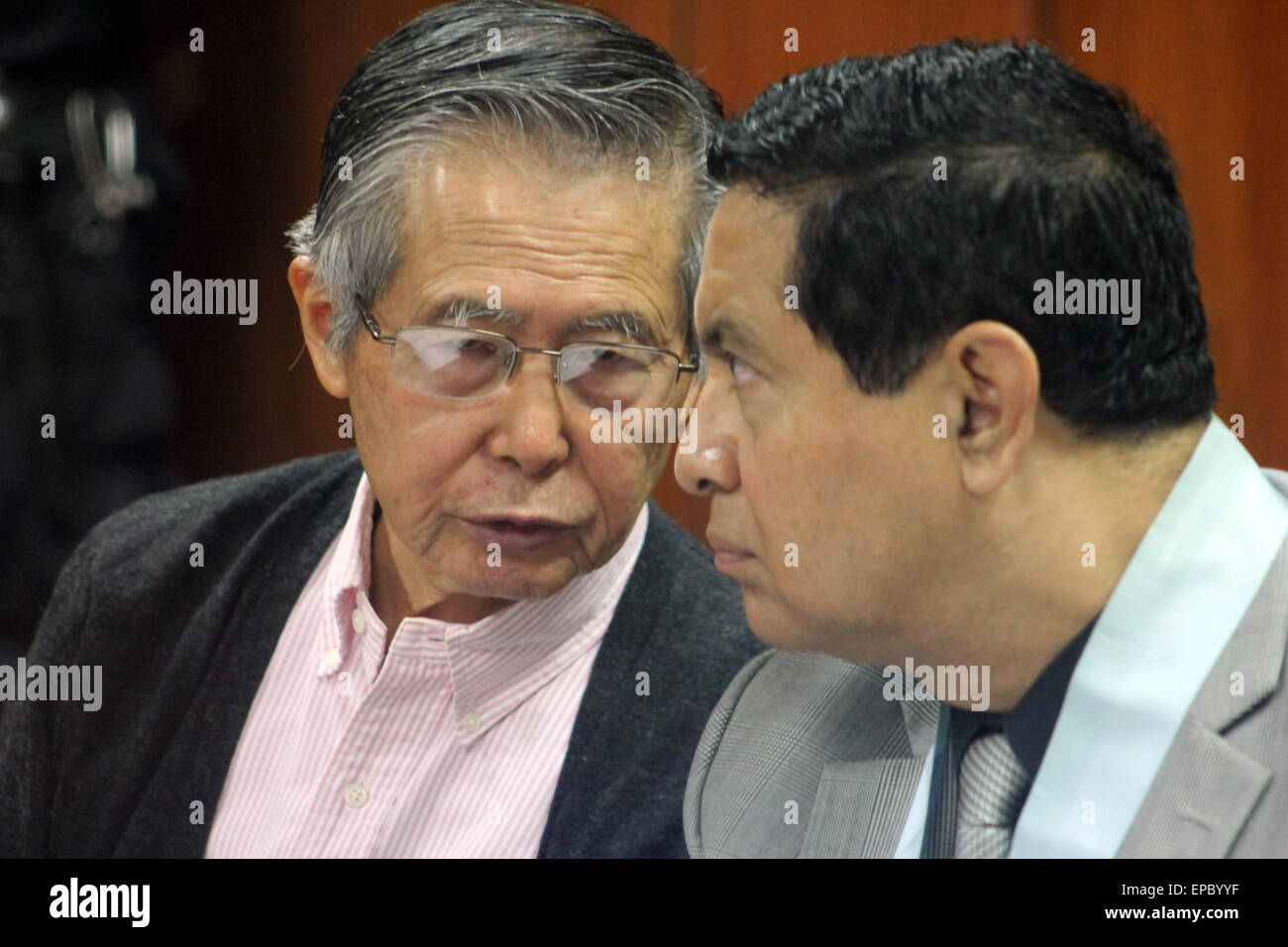 Lima, Peru. 15th May, 2015. Peru's former President Alberto Fujimori (L) talks with his lawyer William Paco Castillo (R) during his hearing in Lima's Supreme Court of Justice in Lima city, capital of Peru, on May 15, 2015. Former Peruvian President Alberto Fujimori presented on Friday an 'Habeas Corpus' for the replacement of the telephone line in his detention center, which was suspended after he granted interviews to the media, according to local press. © Luis Camacho/Xinhua/Alamy Live News Stock Photo