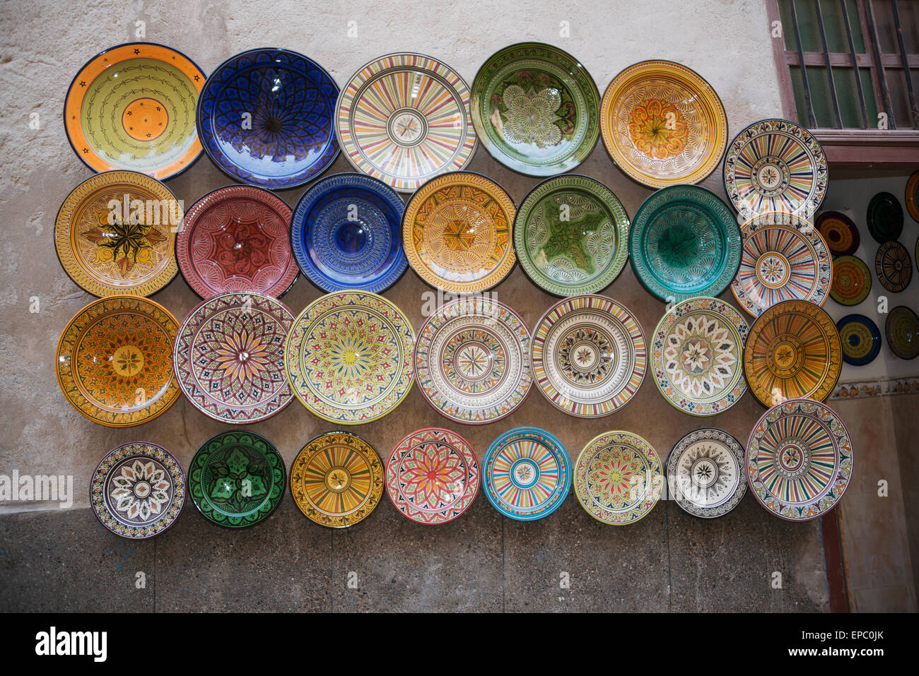 Array of beautifully designed plates for sale on wall display Stock ... Array of beautifully designed plates for sale on wall display Stock ...
