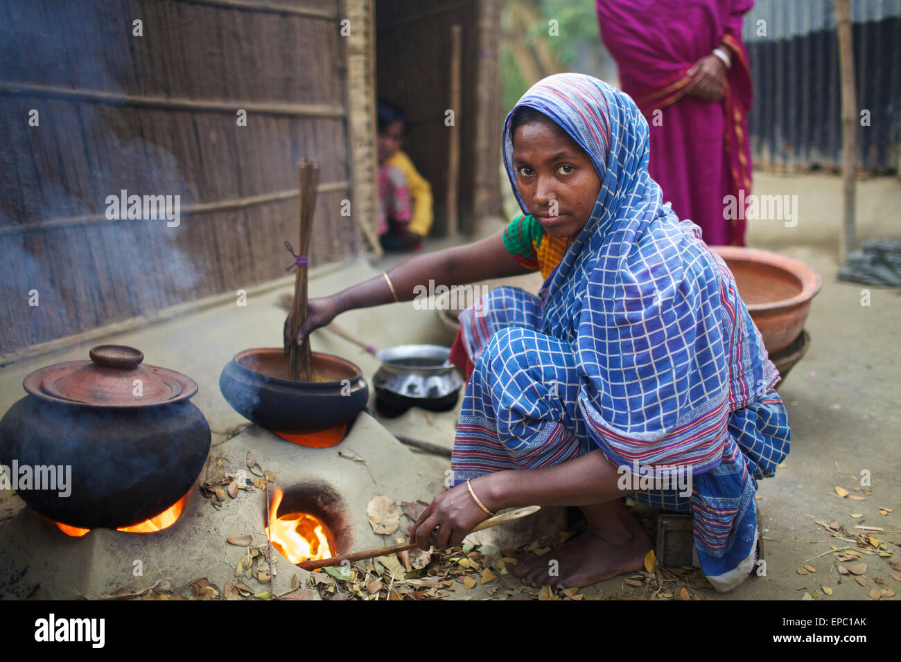 Woman cooking; Kishoreganj, Bangladesh Stock Photo Alamy