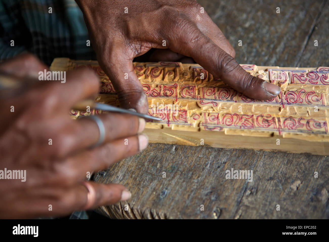 Man making wood carving; Kolkata, West Bengal, India Stock Photo