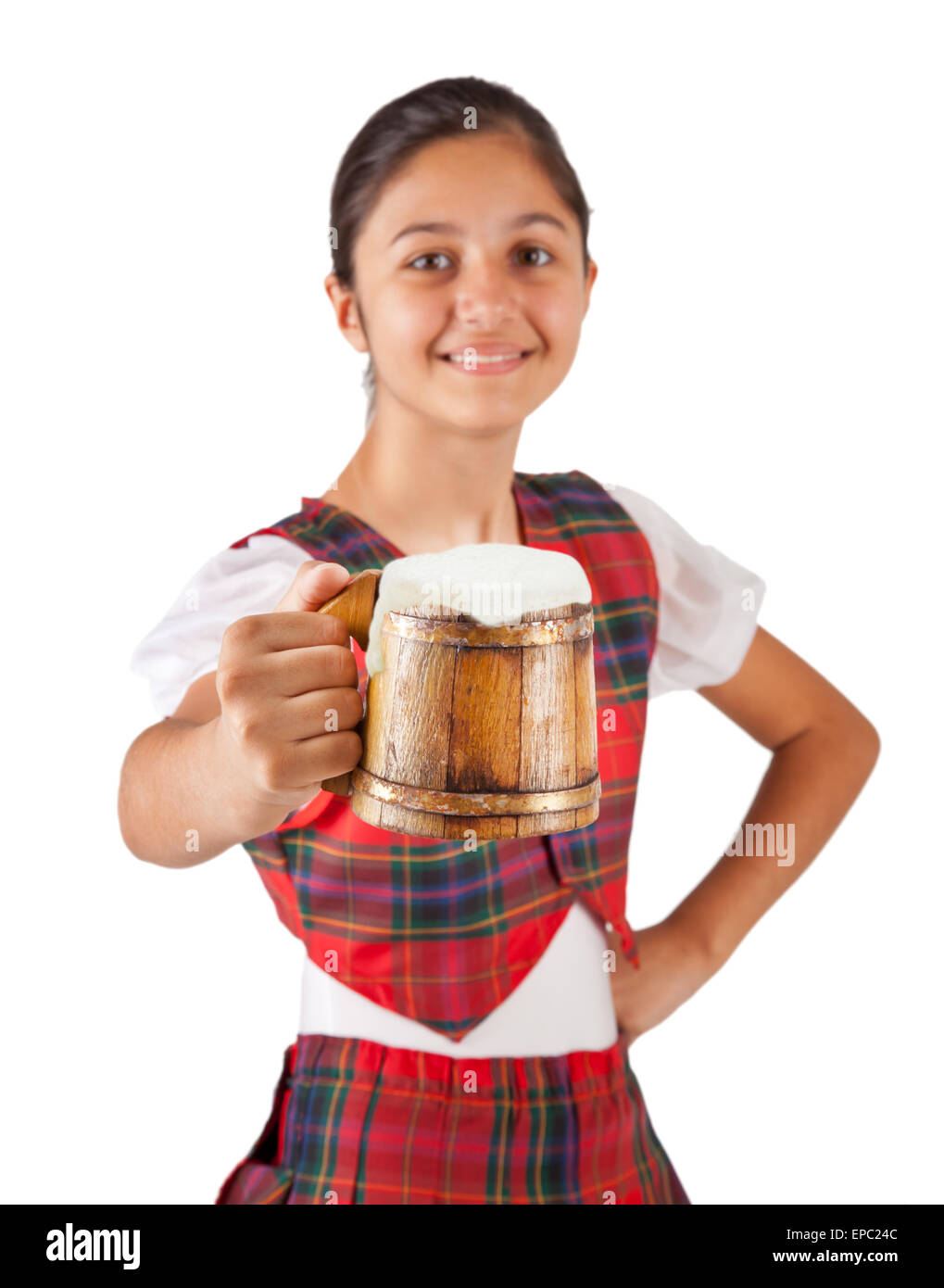 Teenager dressed with red plaid clothing and mug of beer on white background. Stock Photo
