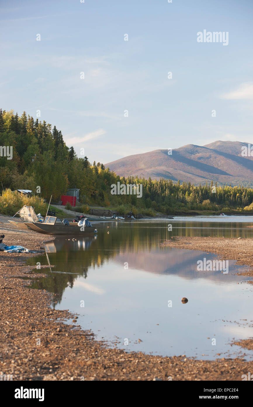 Motor boats moored on a beach along the Kobuk river, Shungnak, Arctic