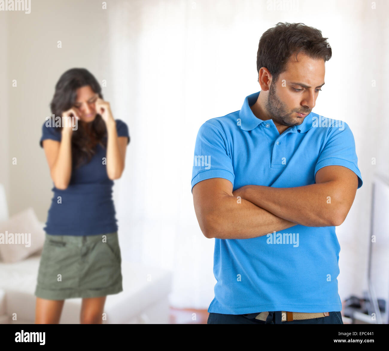 Relationship problems between husband and wife in the home. Stock Photo
