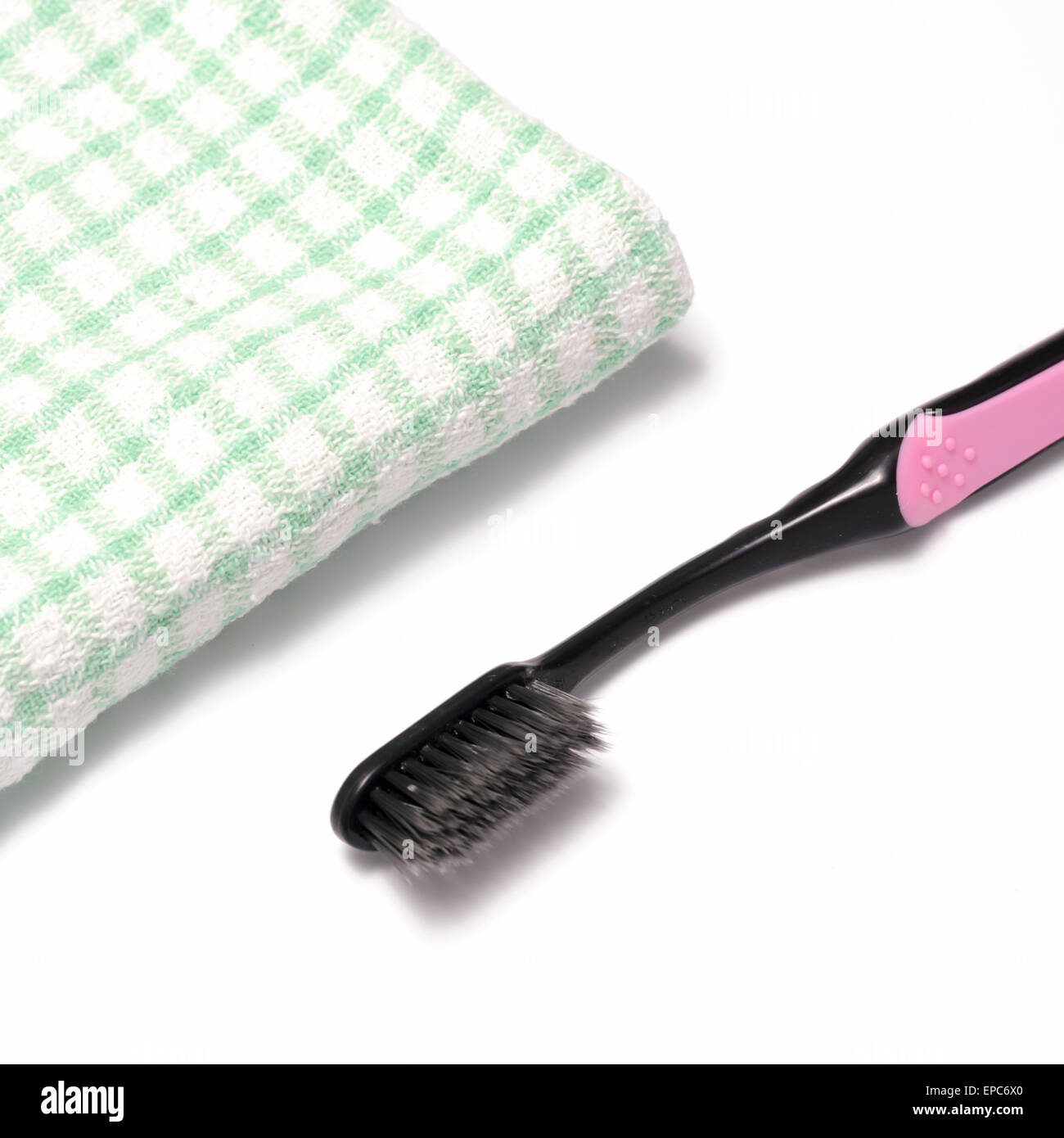 tooth brush and towel on a white background Stock Photo Alamy