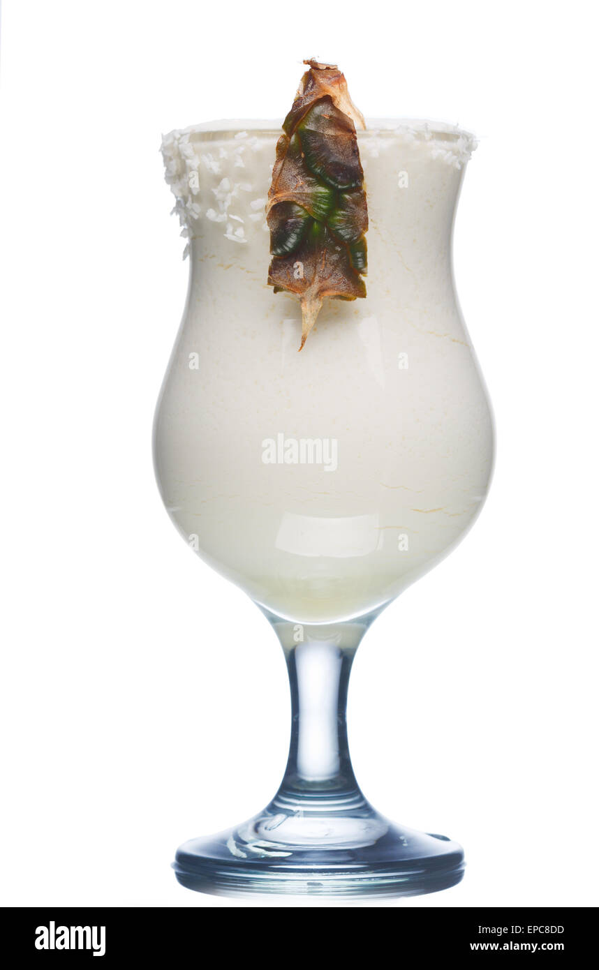 Pina colada alcoholic cocktail in hurrican glass decorated with pineapple slice Stock Photo
