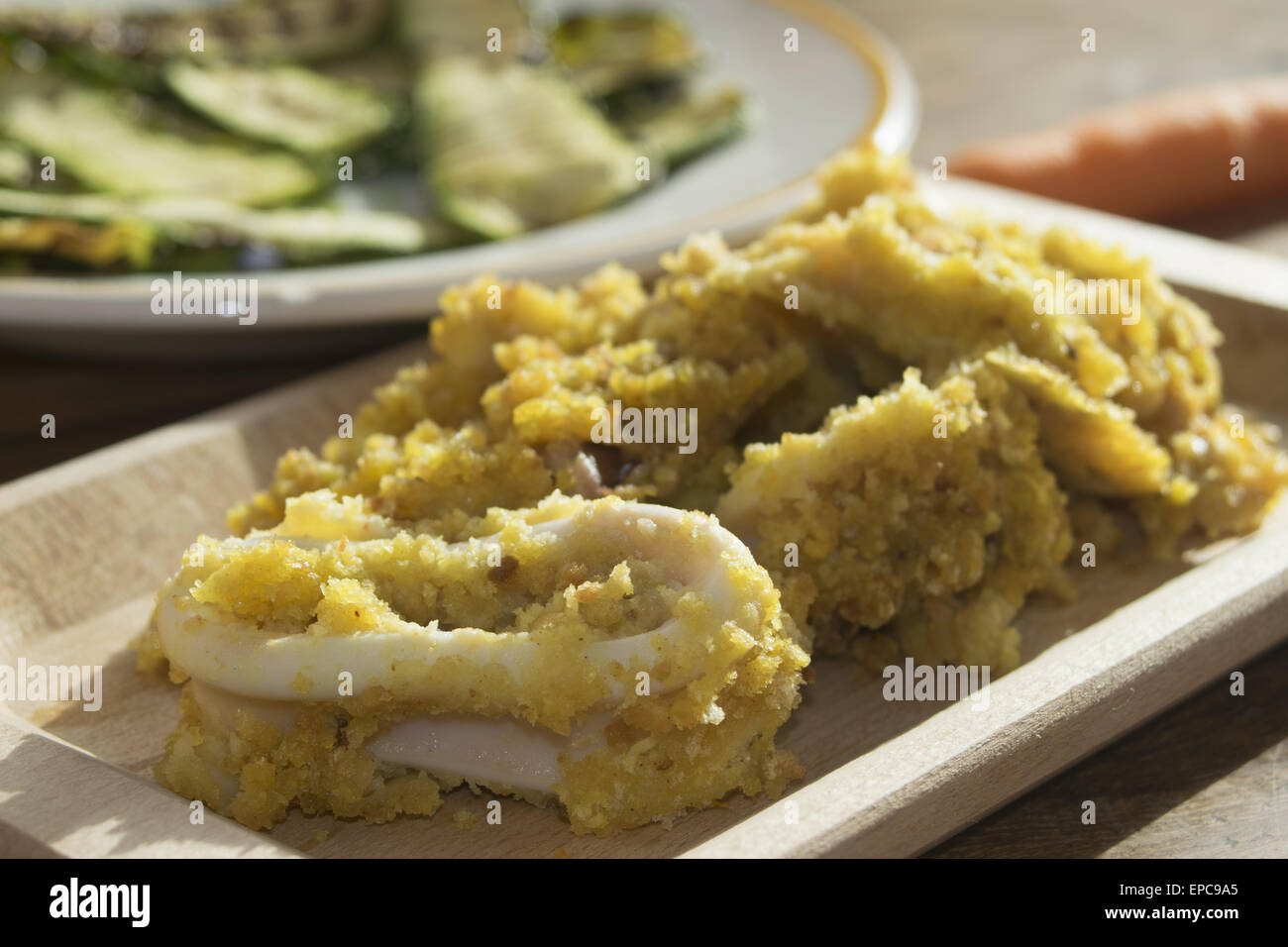 calamari breaded with crumb and aromatic herbs and cooked in the oven