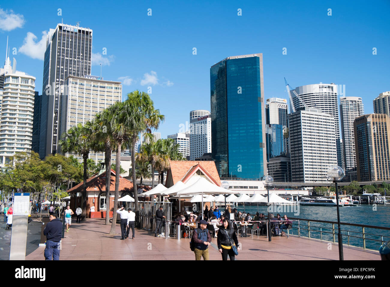 Sydney circular quay harbour side restaurant cafe and central business district skyscraper office buildings in Sydney city centre, Australia Stock Photo