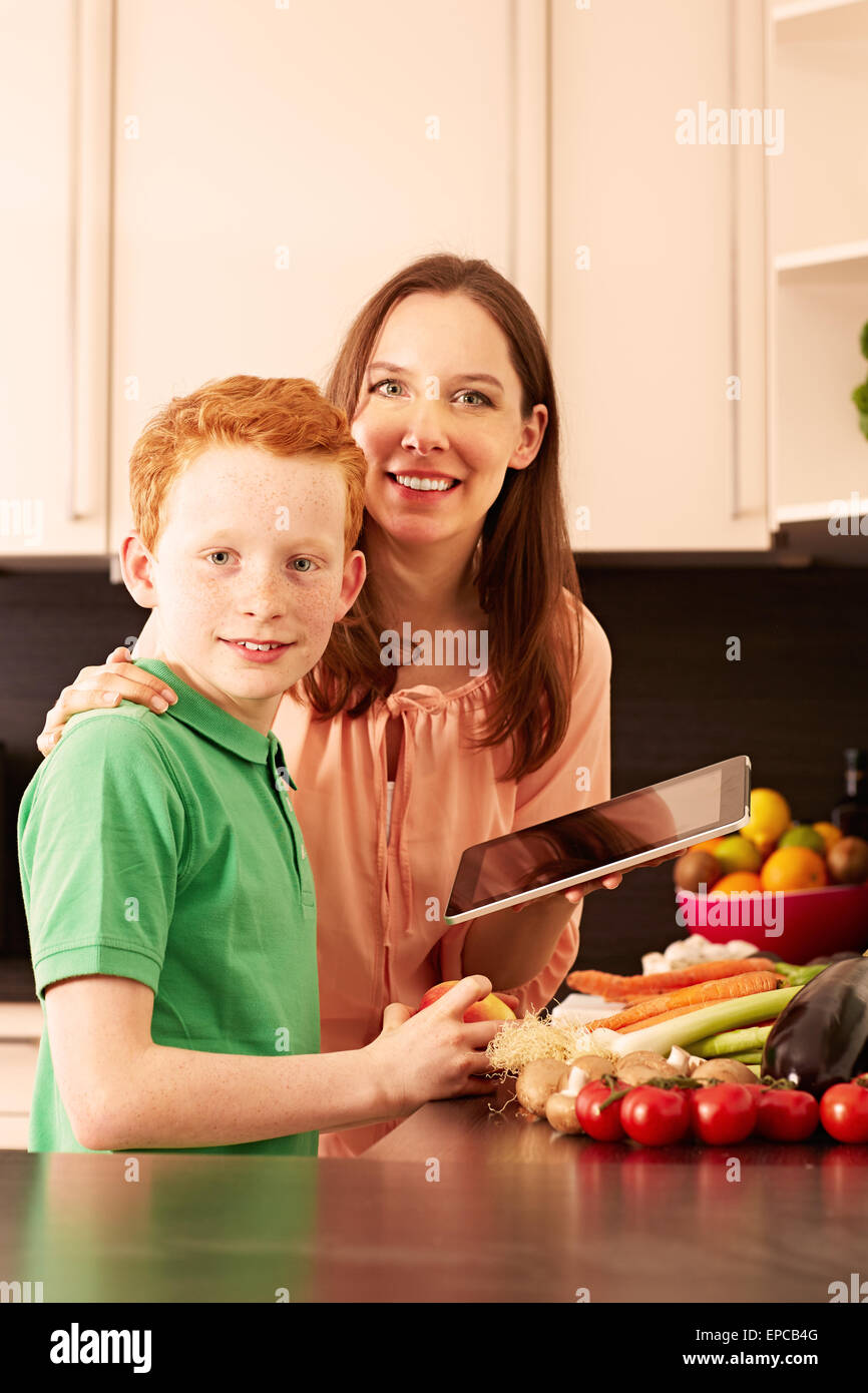 mother and child in the kitchen Stock Photo