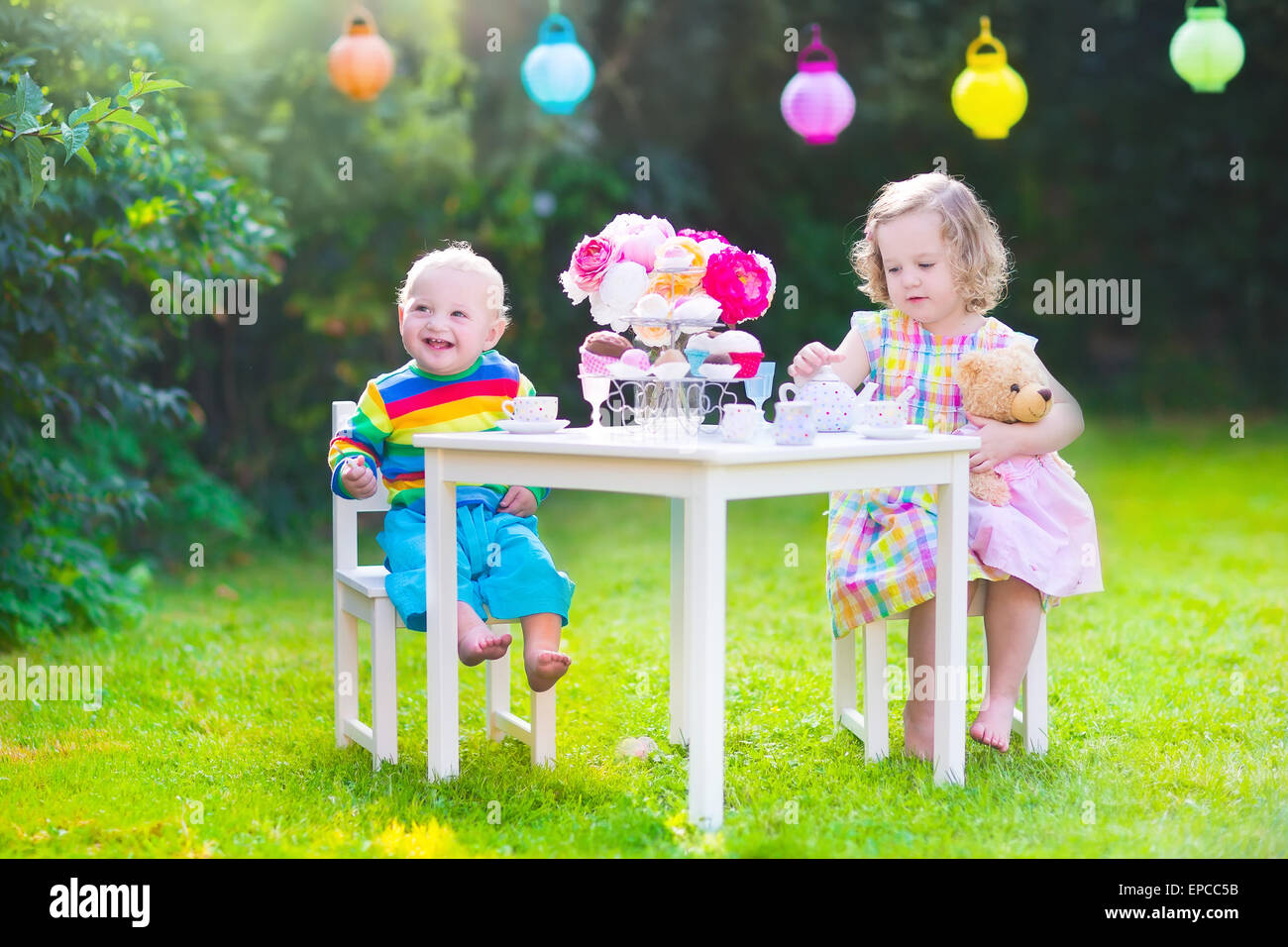 Boy girl playing tea party hi-res stock photography and images - Alamy