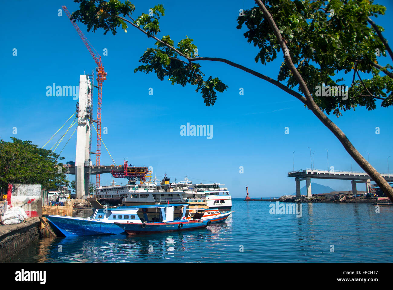 contructing bridge at harbour in manado sulawesi indonesia Stock Photo