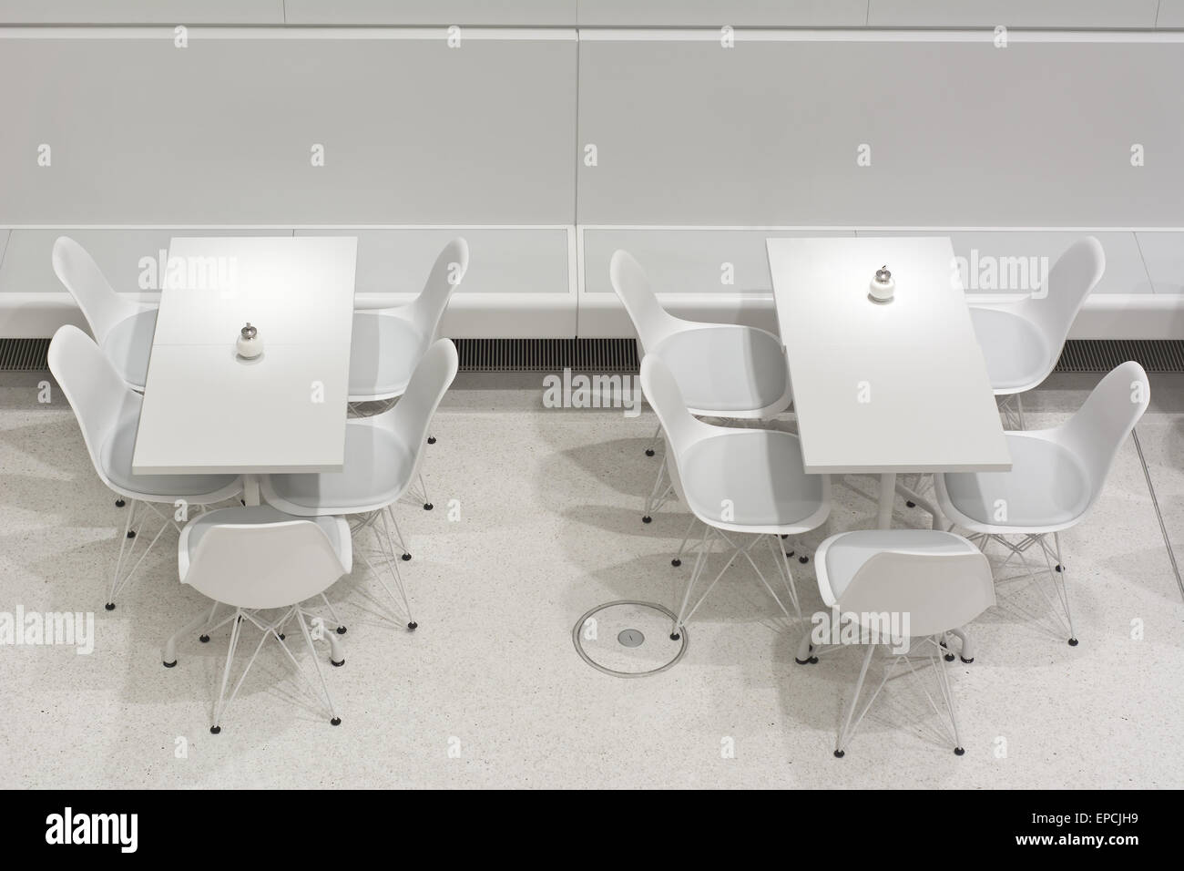 Empty White Interior Restaurant Tables in Modern European Architectural Style Stock Photo