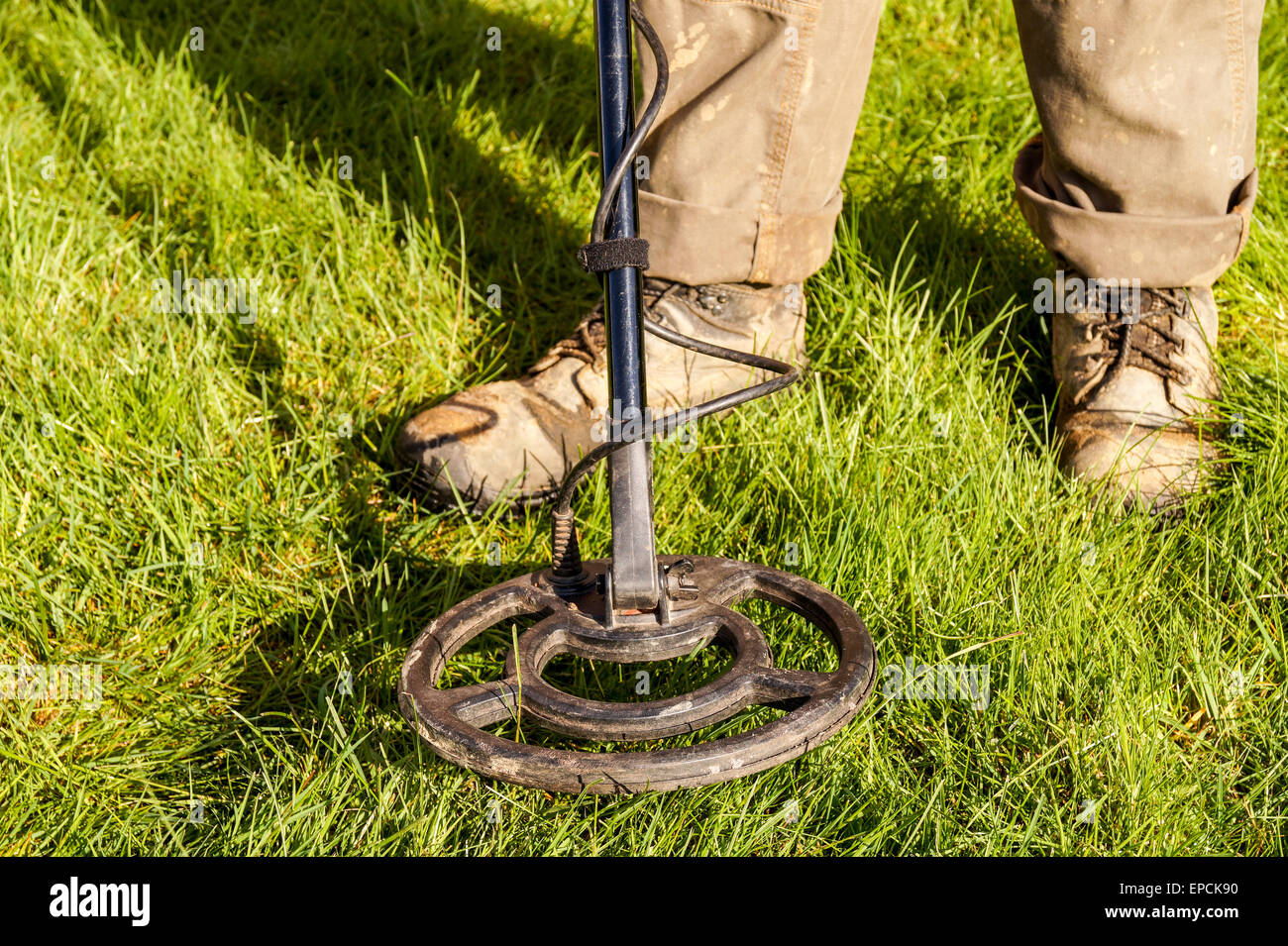 Man holding metal detector hires stock photography and images Alamy
