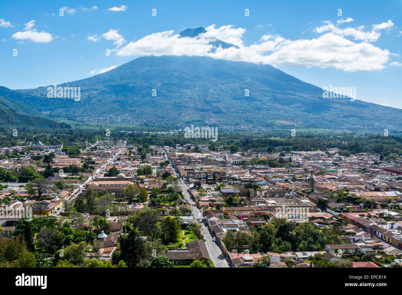Aerial view of Antigua Guatemala with Volcan de Agua in the distance. Stock Photo