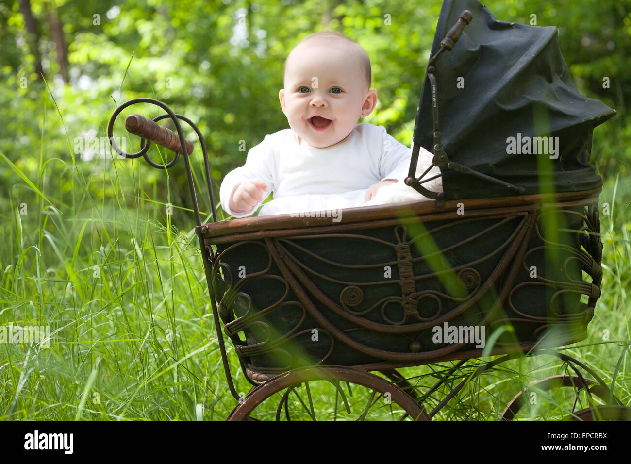 Old fashioned baby in pram hi-res stock photography and images - Alamy