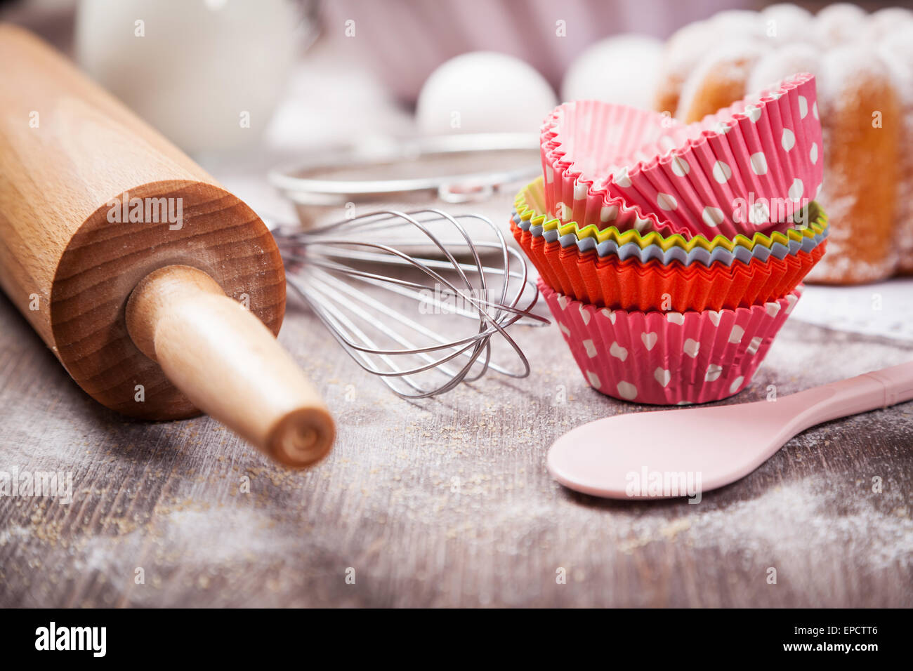 Baking utensils with cupcake cases Stock Photo Alamy