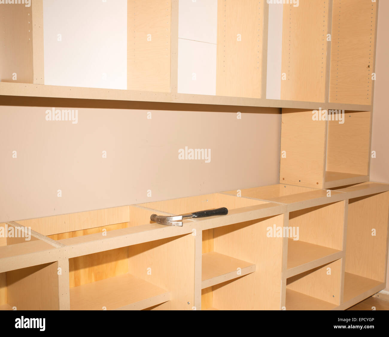 Partially constructed wall unit in a home renovation project Stock Photo