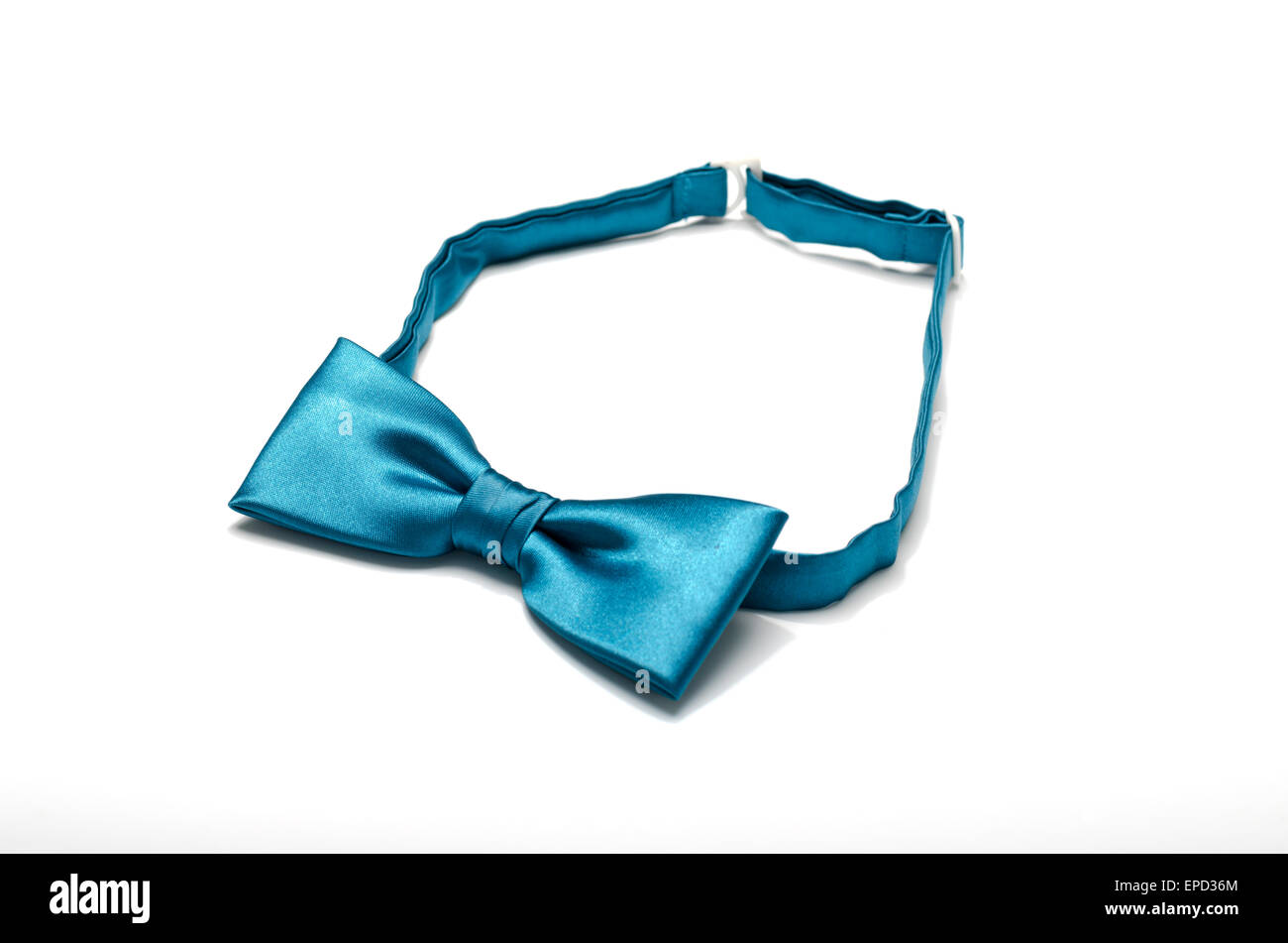 blue bow tie on a white background Stock Photo - Alamy