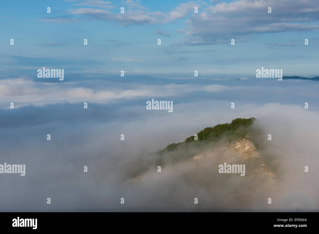 Panorama of Apennines from over the fog and clouds, summer, Umbria, Italy Stock Photo