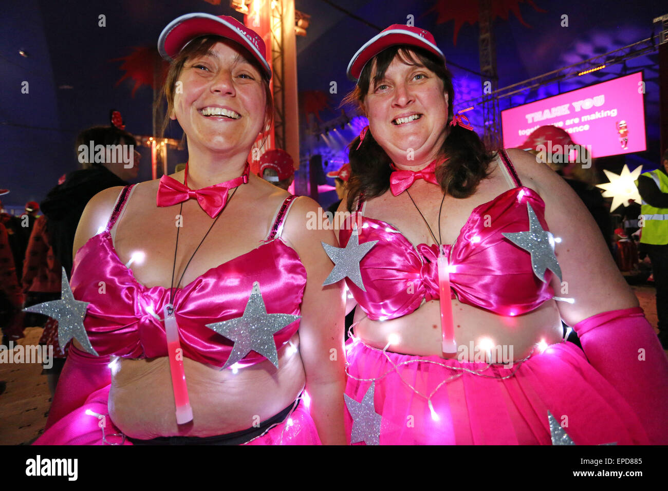 London, UK. 16th May 2015. Participants with illuminated bras at the Walk  the Walk, Moonwalk charity marathon 2015, London, England, raising funds to  help beat breast cancer by walking a marathon around