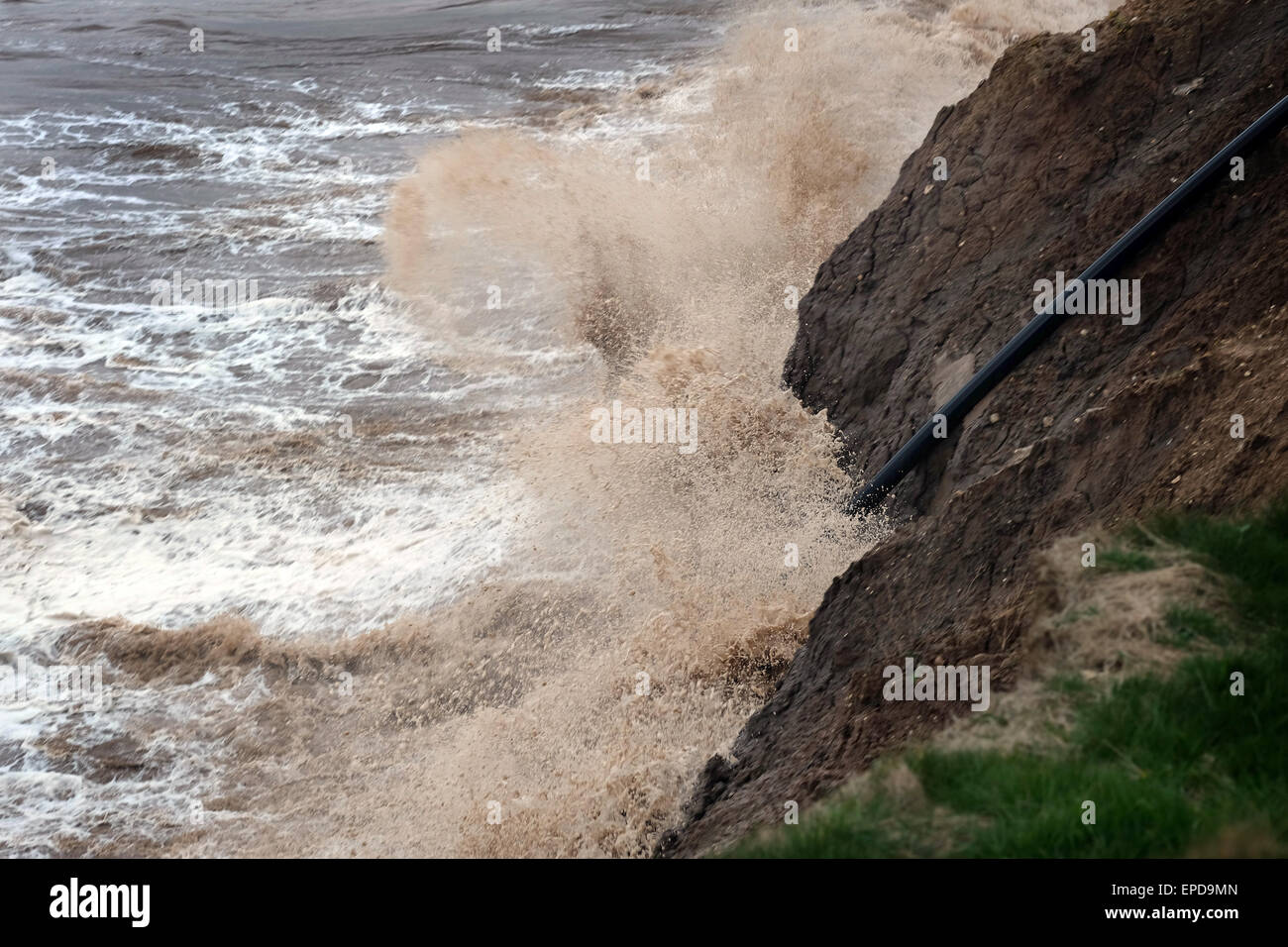 Rough water in the north sea causing heavy clay cliff erosion on the
