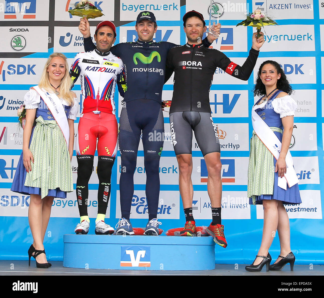 Hassfurt, Germany. 15th May, 2015. HANDOUT - (l-r) Thiago Machado (2nd place), Alex Dowsett (1st place) and Jan Barta (3rd place), oise on the podium during the award ceremony after the bicycle race International Bayern Rundfahrt (Tour of Bavaria) in Hassfurt, Germany, 15 May 2015. Photo: Bayern Rundfahrt/Rene Vigneron/dpaMANDATORY CREDITS: Photo: Bayern Rundfahrt/Rene Vigneron/dpa)/dpa/Alamy Live News Stock Photo