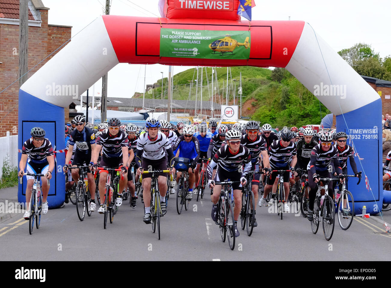 Watchet, Somerset, UK. 17th May, 2015. Hundreds of cyclists set off from Watchet for the annual Dorset and Somerset Air Ambulance Coast to Coast Cycle Challenge. The full route goes through some spectactular West Country scenery before ending 54 miles later in West Bay, Dorset. Credit:  Tom Corban/Alamy Live News Stock Photo