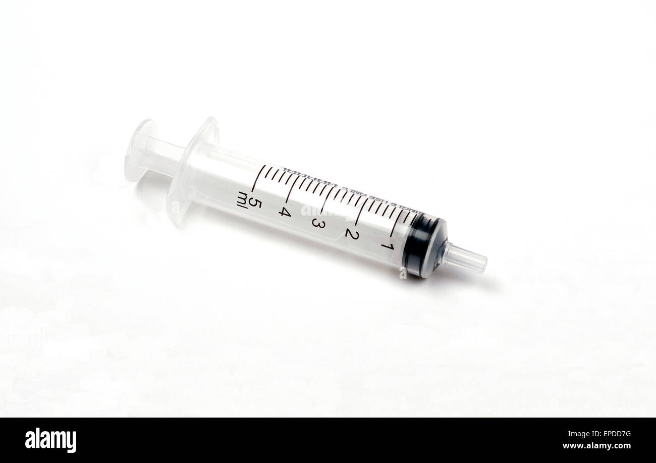 plastic  syringe on a white background Stock Photo