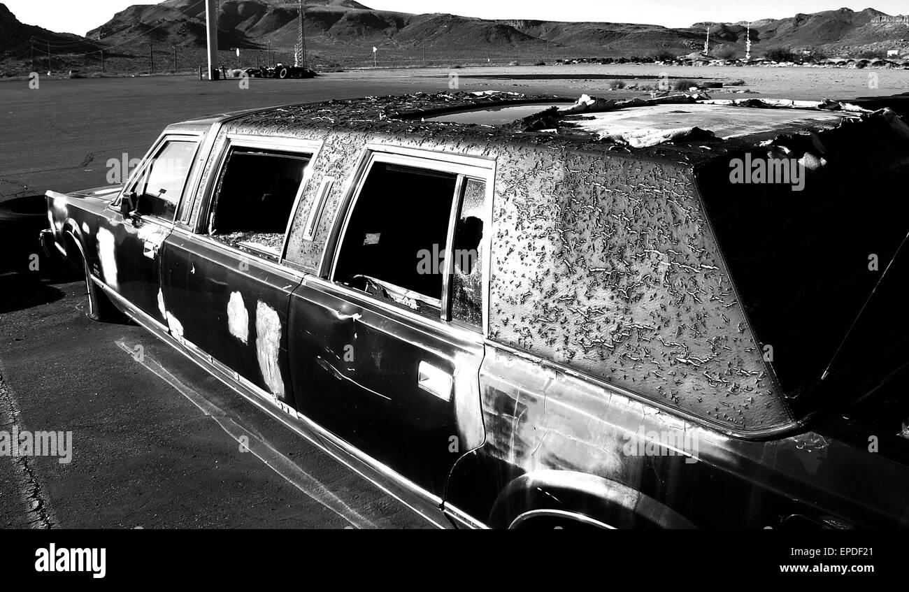 Wrecked limousine at roadside Stock Photo